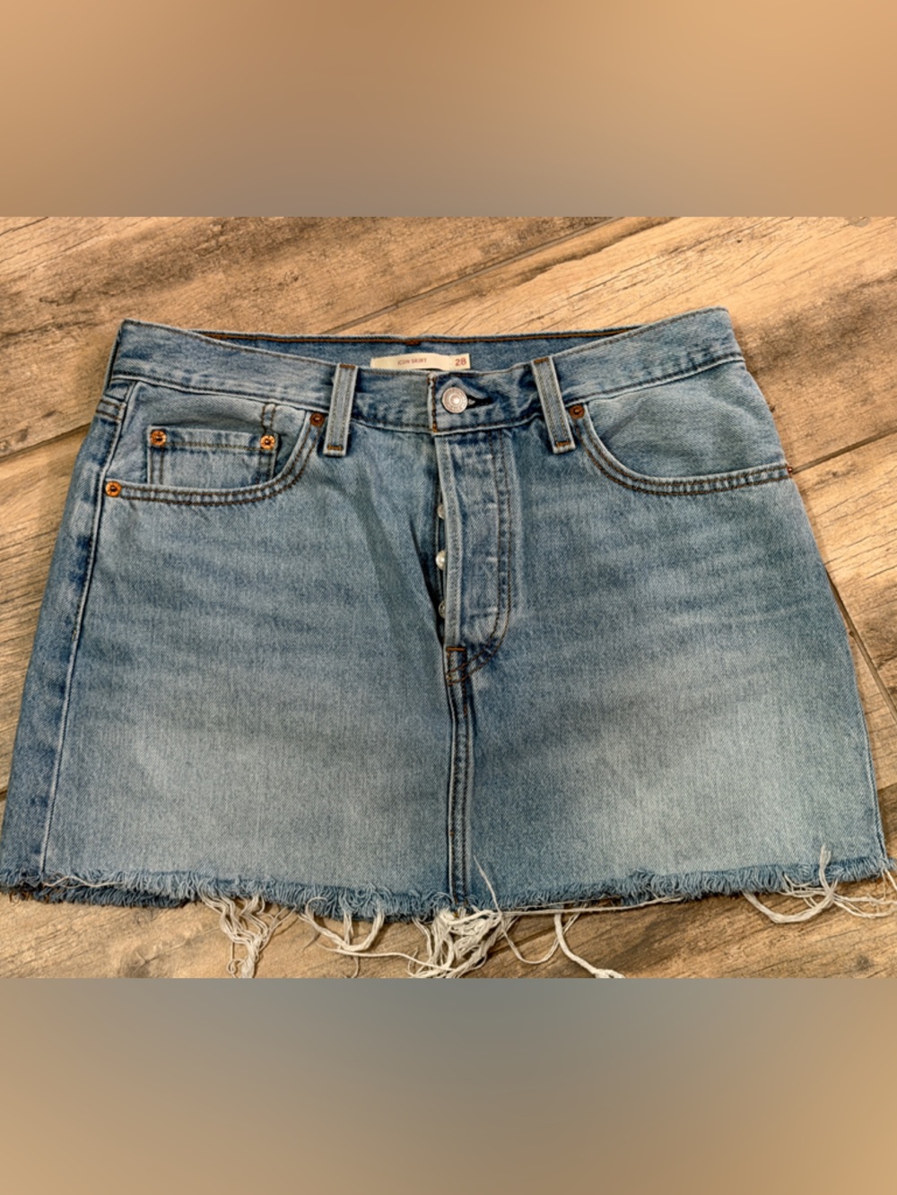 Levi’s Light Wash Denim Mini Skirt with Frayed Hem